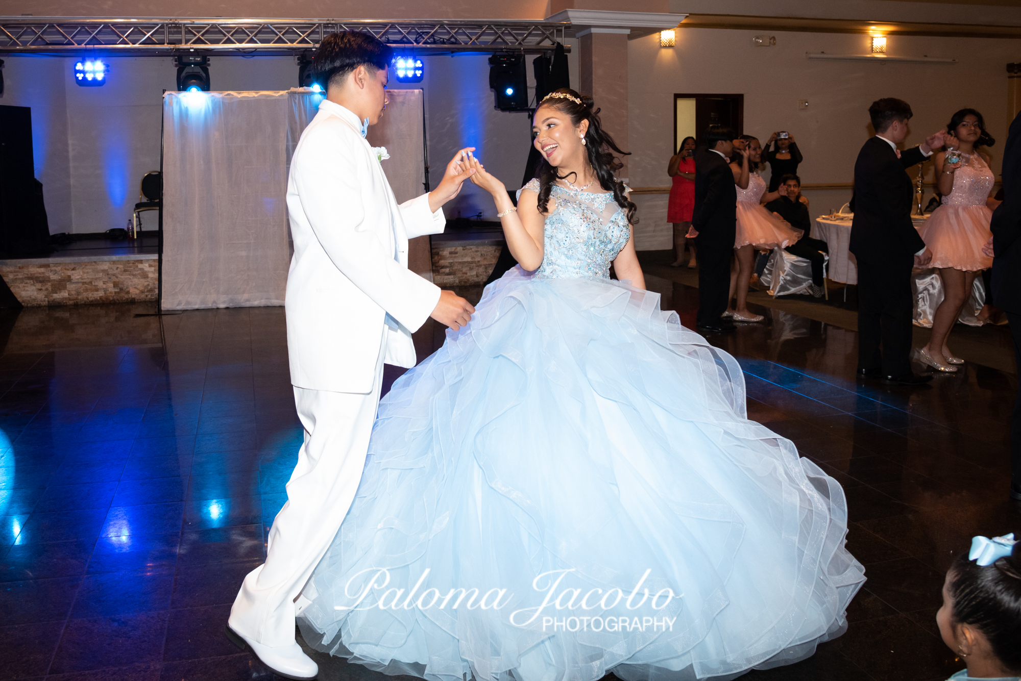 Quinceanera dancing by Paloma Jacobo Photography