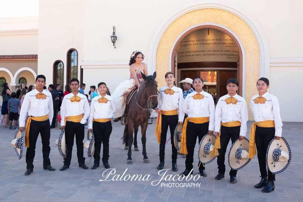 Quinceanera charra riding horse with Chambelanes charros by Paloma Jacobo Photography