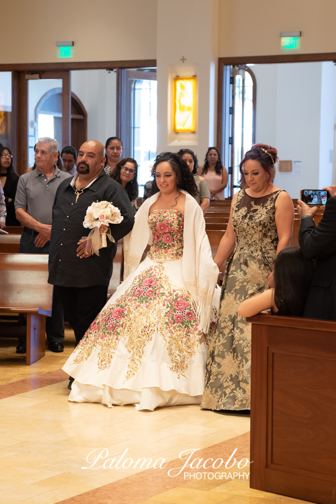 Quinceanera walking into church by Paloma Jacobo Photography