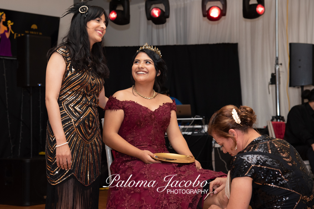 Quinceanera during the change of shoes ceremony