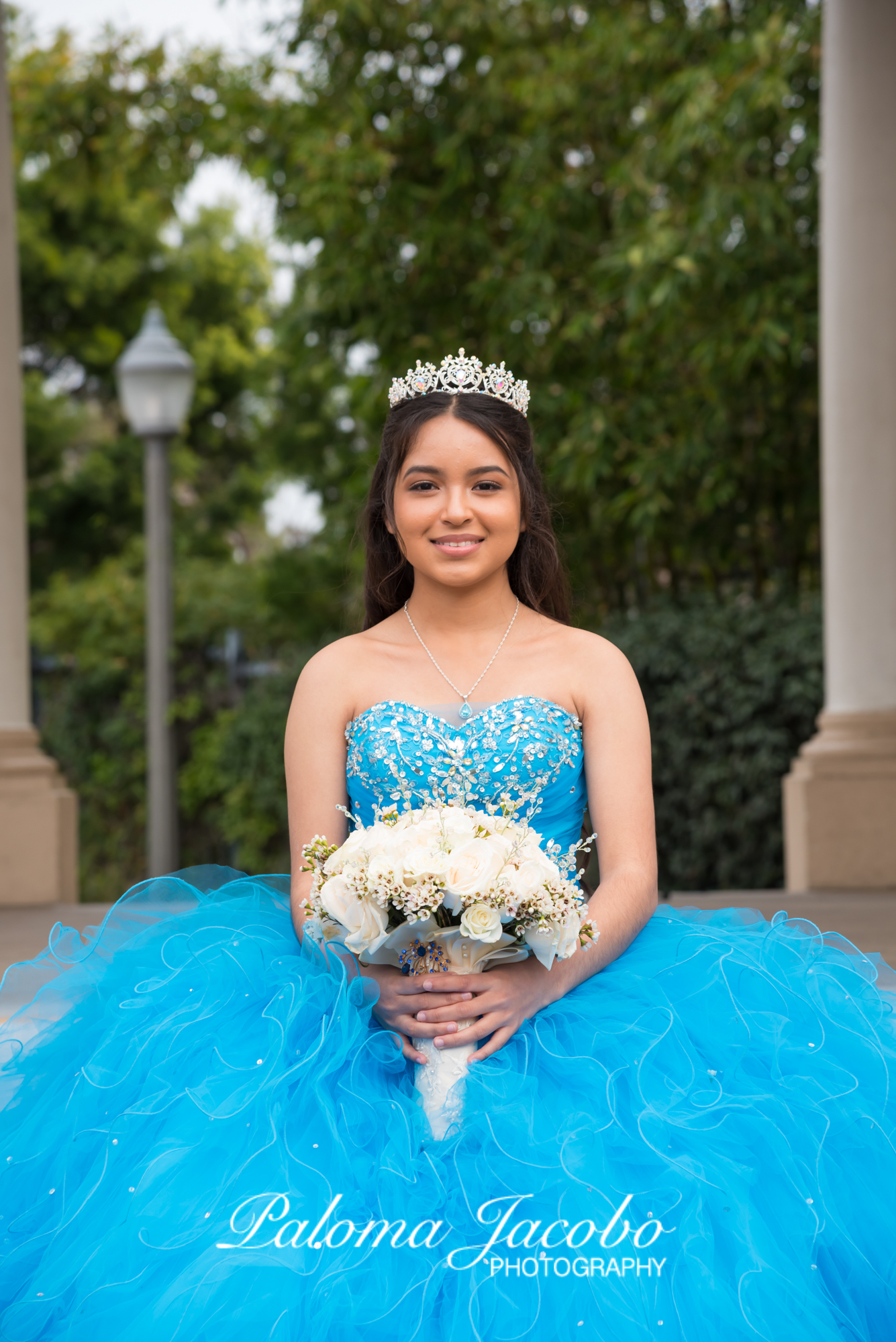 Quinceanera Photo Shoot at Balboa Park on a rainy day  by Paloma Jacobo Photography