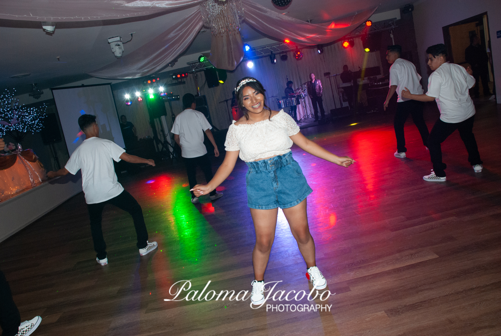 Quinceanera dancing surprise dance by Paloma Jacobo Photography