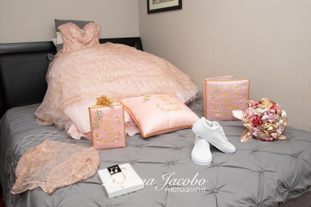 Blush pink Quinceanera Dress and accessories by Paloma Jacobo Photography