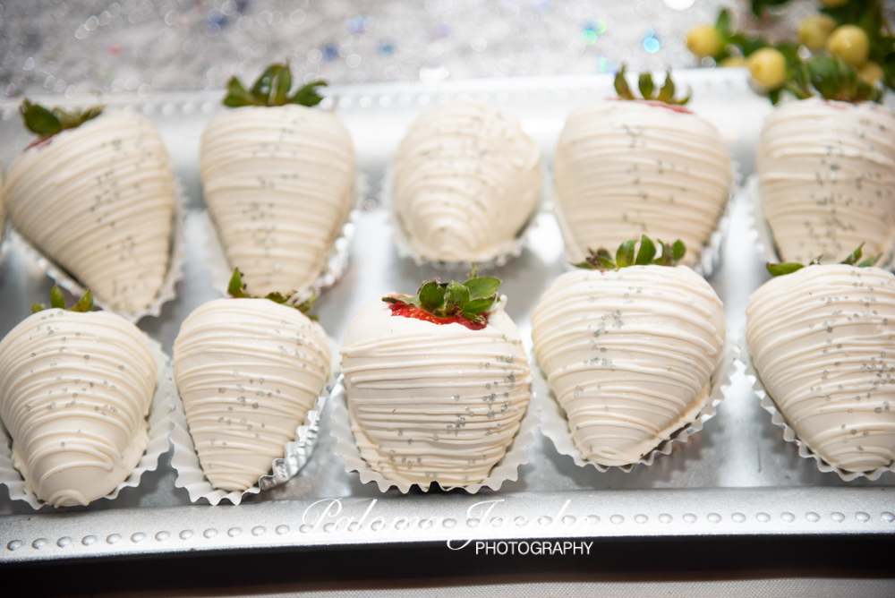 white chocolate covered strawberries on a plate