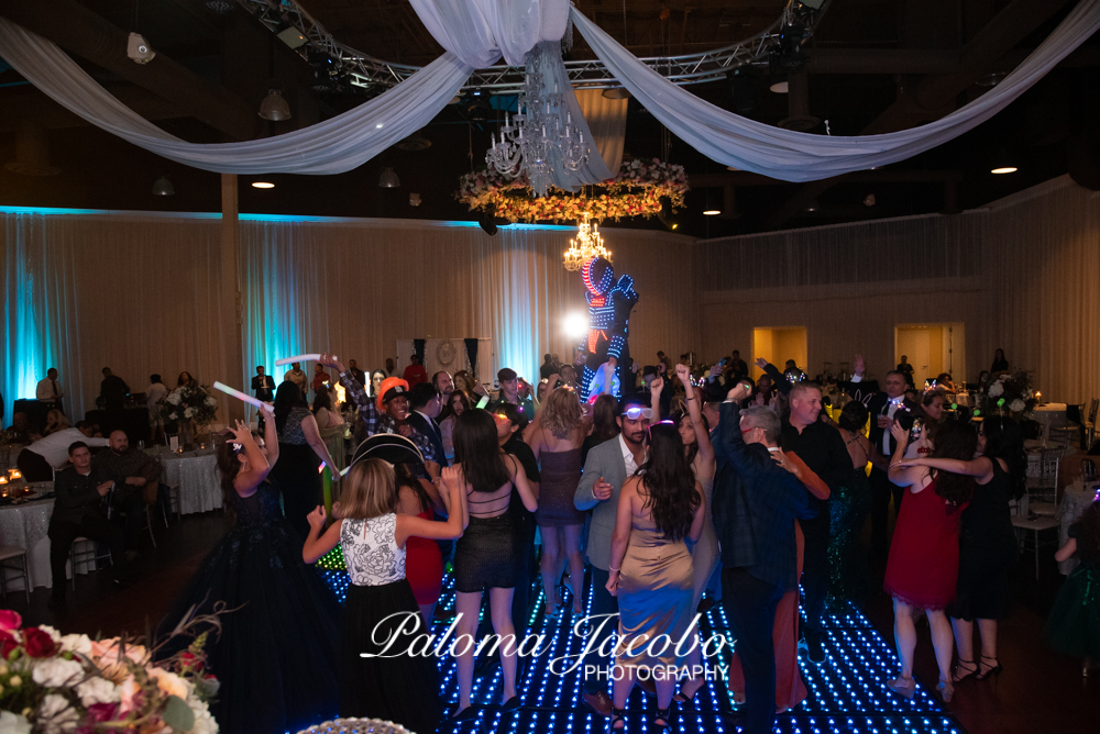 People dancing and having fun at a Quinceanera party