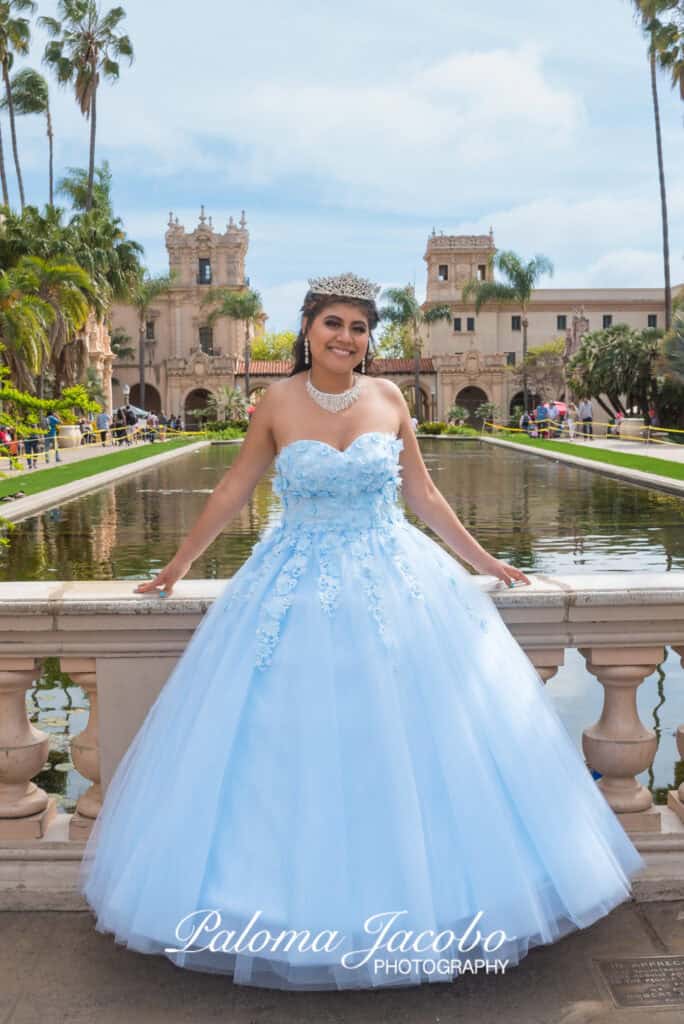 Quinceanera showing her dress at Balboa Park